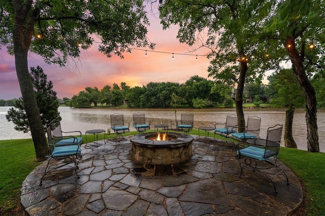 18816 Otter Creek Dr, Edmond, OK 73012 - view of patio with a fire pit and a water view