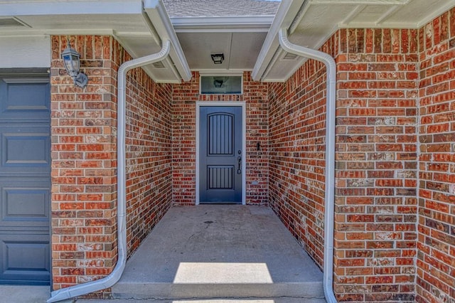 816 Lakeview Dr, Moore, OK 73160 - doorway to property with brick siding