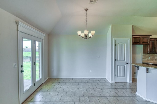 816 Lakeview Dr, Moore, OK 73160 - unfurnished dining area featuring plenty of natural light, a chandelier, vaulted ceiling, and light tile patterned flooring
