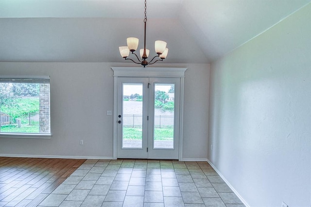 816 Lakeview Dr, Moore, OK 73160 - entryway with lofted ceiling, plenty of natural light, and a chandelier