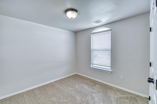816 Lakeview Dr, Moore, OK 73160 - carpeted empty room featuring baseboards