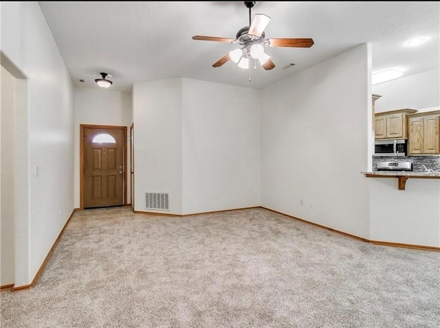 4601 Churchill, Shawnee, OK 74804 - unfurnished living room with light colored carpet and ceiling fan