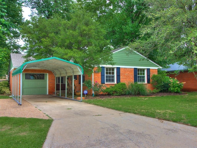 1213 Leslie Ln, Norman, OK 73069 - view of front facade with concrete driveway, a detached carport, a front yard, and brick siding