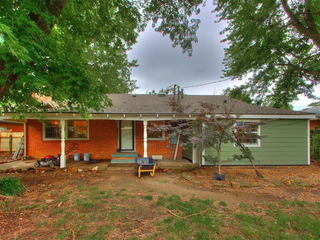 1213 Leslie Ln, Norman, OK 73069 - back of house with brick siding