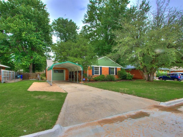 1213 Leslie Ln, Norman, OK 73069 - view of front of house featuring a carport and concrete driveway
