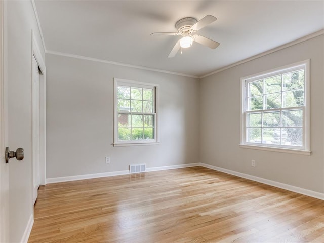 1213 Leslie Ln, Norman, OK 73069 - empty room with ornamental molding, light wood-style flooring, and a ceiling fan