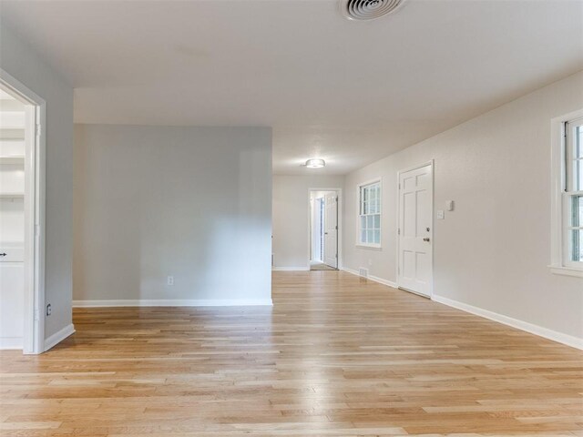 1213 Leslie Ln, Norman, OK 73069 - entrance foyer with light wood-style floors and baseboards