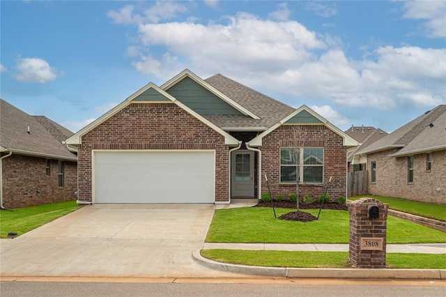 3808 Palmetto Trl, Oklahoma City, OK 73179 - view of front of house featuring concrete driveway, a garage, brick siding, a front yard, and roof with shingles