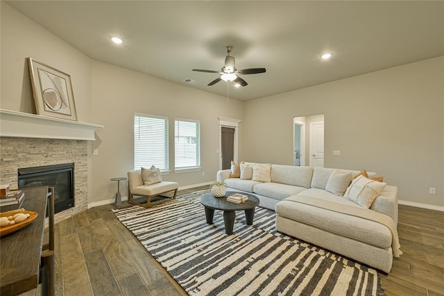 3808 Palmetto Trl, Oklahoma City, OK 73179 - living room with ceiling fan, a stone fireplace, dark wood-style flooring, and recessed lighting