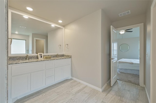 3808 Palmetto Trl, Oklahoma City, OK 73179 - full bath with double vanity, a ceiling fan, ensuite bathroom, and recessed lighting