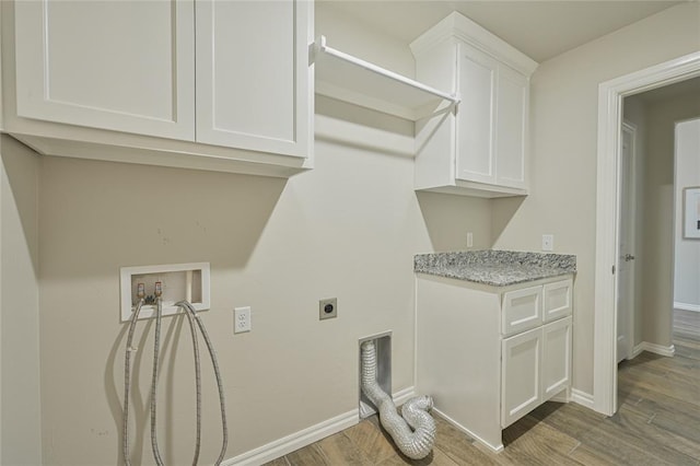 3808 Palmetto Trl, Oklahoma City, OK 73179 - washroom featuring hookup for an electric dryer, washer hookup, cabinet space, and wood finished floors
