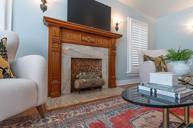 416 W Hill St, Oklahoma City, OK 73118 - living area featuring wood finished floors and vaulted ceiling