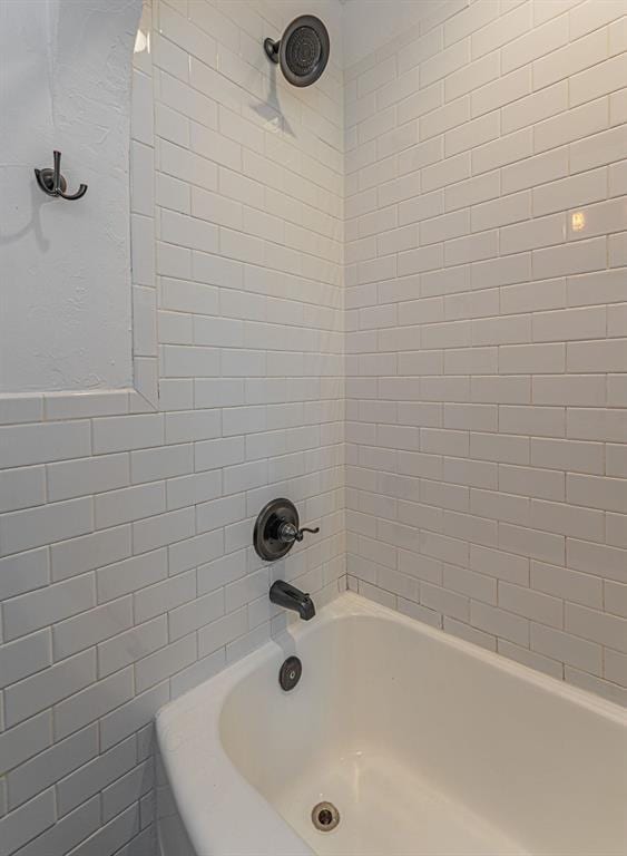 416 W Hill St, Oklahoma City, OK 73118 - bathroom with tile walls and shower / bathtub combination