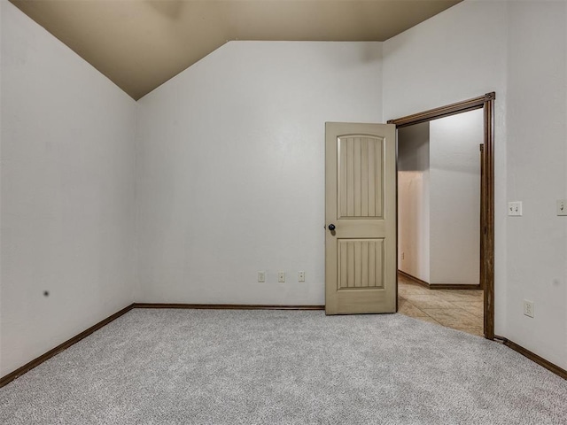 2801 SE 5th St, Moore, OK 73160 - spare room featuring carpet and lofted ceiling