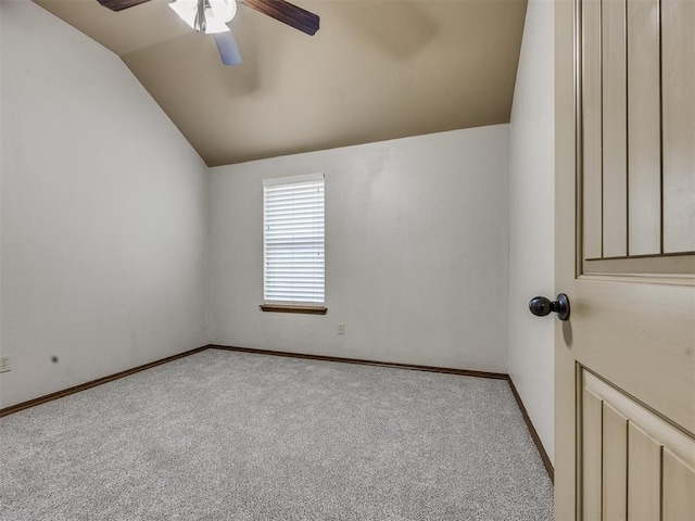 2801 SE 5th St, Moore, OK 73160 - spare room with vaulted ceiling, carpet floors, and ceiling fan