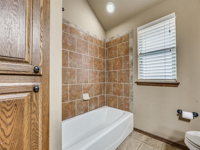 2801 SE 5th St, Moore, OK 73160 - bathroom featuring tile patterned flooring, lofted ceiling, and shower / bath combination