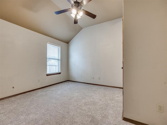 2801 SE 5th St, Moore, OK 73160 - spare room with vaulted ceiling, carpet floors, and ceiling fan