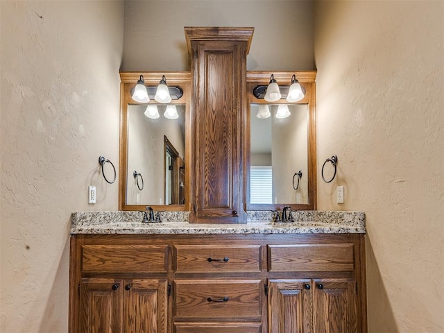 2801 SE 5th St, Moore, OK 73160 - full bath with double vanity and a textured wall