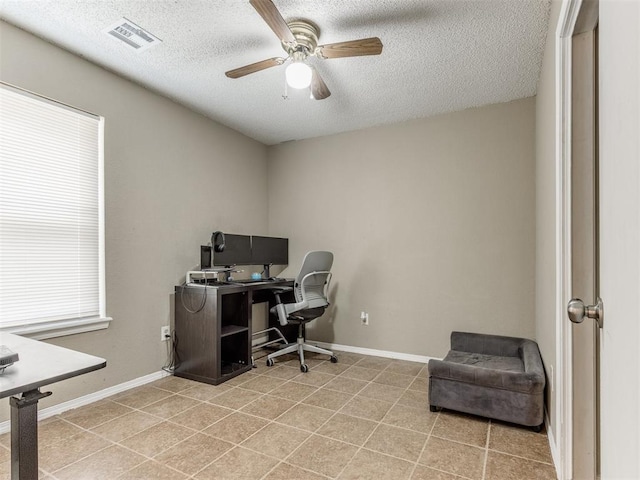 12501 SW 6th St, Yukon, OK 73099 - office featuring ceiling fan, a textured ceiling, and light tile patterned flooring