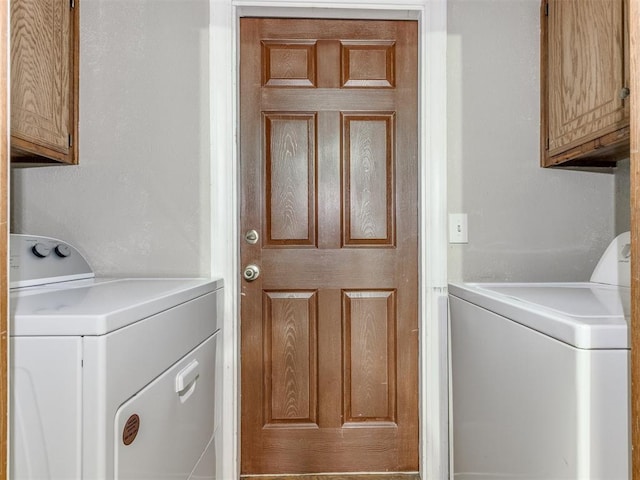 12501 SW 6th St, Yukon, OK 73099 - laundry area featuring cabinet space and independent washer and dryer