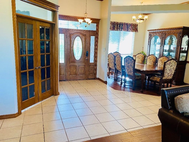 450 Hickory Hill Dr, Choctaw, OK 73020 - foyer entrance with a chandelier, french doors, and light tile patterned flooring