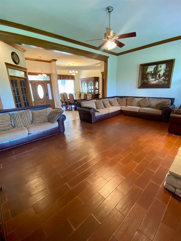 450 Hickory Hill Dr, Choctaw, OK 73020 - living area featuring a ceiling fan, ornamental molding, a chandelier, and wood finished floors