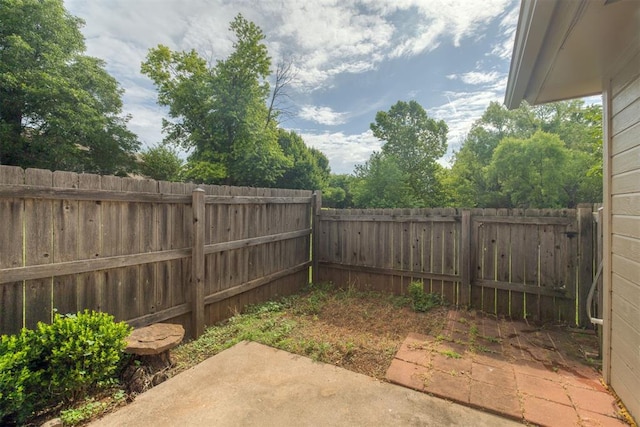 12210 High Meadow Ct, Oklahoma City, OK 73170 - fenced backyard with a patio