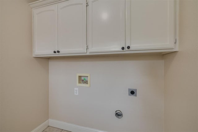 12210 High Meadow Ct, Oklahoma City, OK 73170 - laundry area featuring electric dryer hookup, hookup for a washing machine, and cabinet space