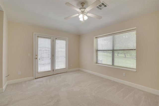 12210 High Meadow Ct, Oklahoma City, OK 73170 - empty room with light colored carpet and a ceiling fan
