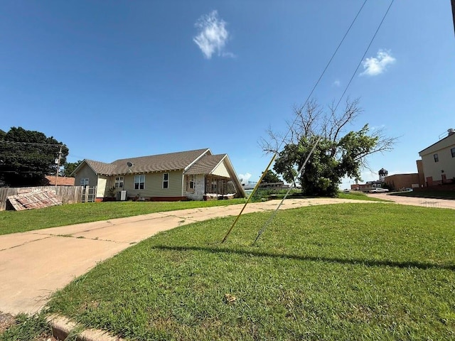 223 N Market St, Cordell, OK 73632 - view of side of property with a cooling unit