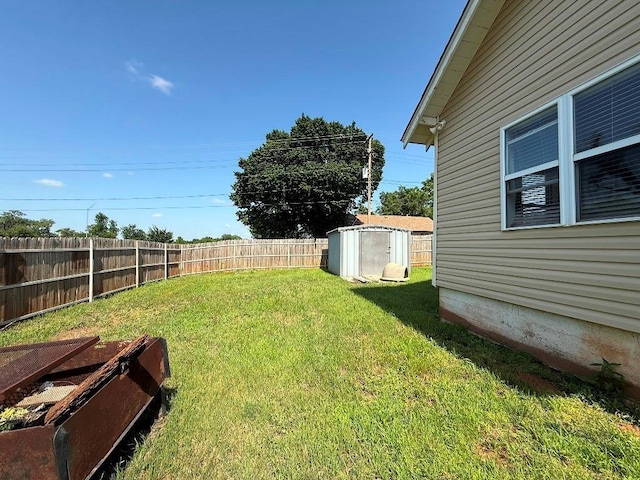 223 N Market St, Cordell, OK 73632 - fenced backyard featuring a shed