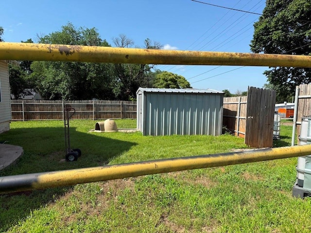 223 N Market St, Cordell, OK 73632 - fenced backyard featuring a storage unit