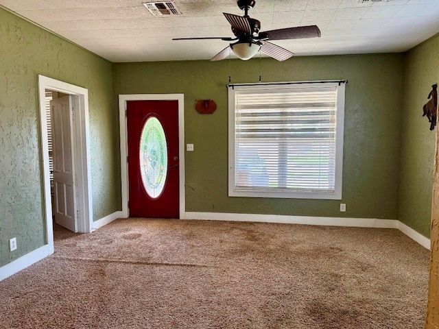 223 N Market St, Cordell, OK 73632 - carpeted entrance foyer featuring healthy amount of natural light and ceiling fan