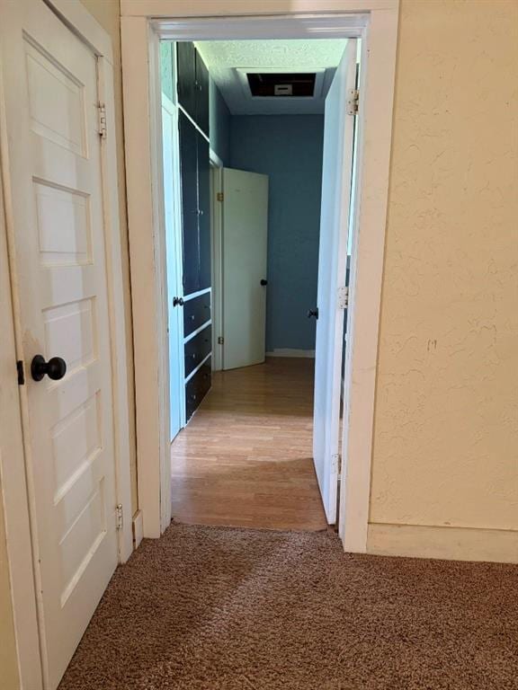 223 N Market St, Cordell, OK 73632 - hall featuring carpet and a textured wall