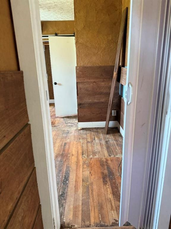 223 N Market St, Cordell, OK 73632 - corridor with hardwood / wood-style floors