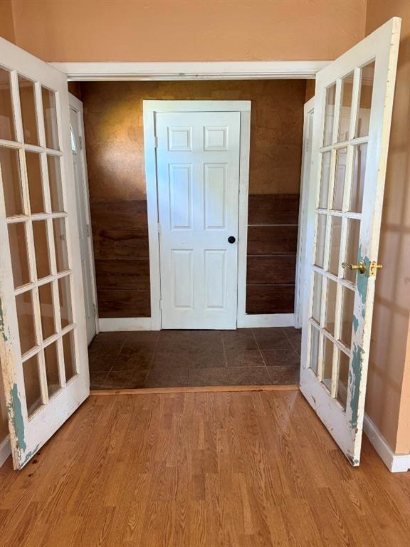 223 N Market St, Cordell, OK 73632 - entryway featuring wood finished floors and french doors