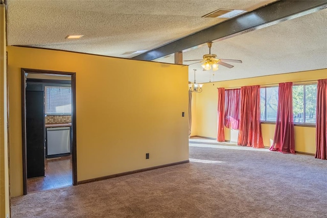 2728 NE 99th St, Oklahoma City, OK 73131 - carpeted spare room featuring ceiling fan, a textured ceiling, and a chandelier