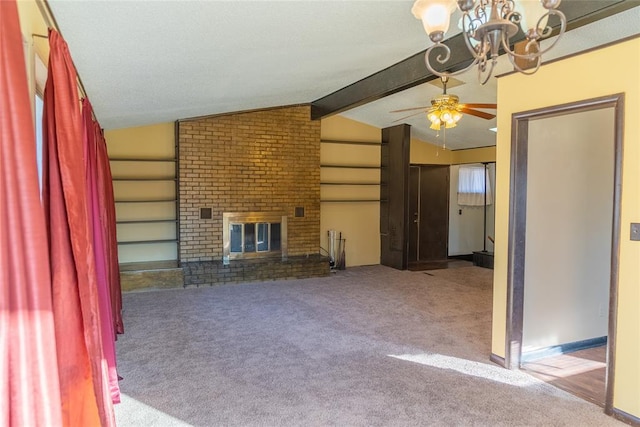 2728 NE 99th St, Oklahoma City, OK 73131 - unfurnished living room featuring carpet flooring, ceiling fan, a chandelier, and a fireplace