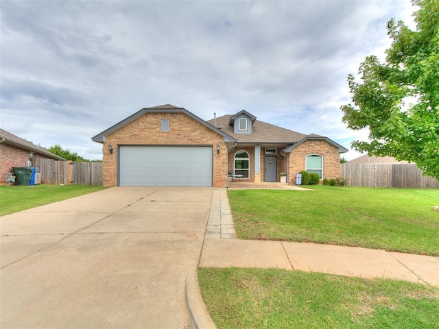 1401 Baycharter St, Norman, OK 73071 - traditional home featuring brick siding, an attached garage, concrete driveway, and a porch