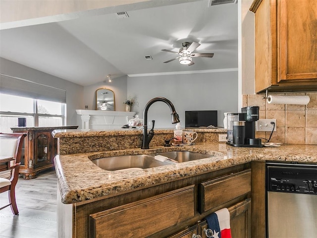 1401 Baycharter St, Norman, OK 73071 - kitchen featuring dishwasher, light stone countertops, a ceiling fan, decorative backsplash, and ornamental molding