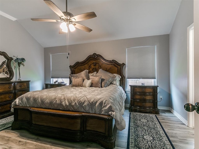 1401 Baycharter St, Norman, OK 73071 - bedroom featuring light wood-style flooring, vaulted ceiling, and a ceiling fan