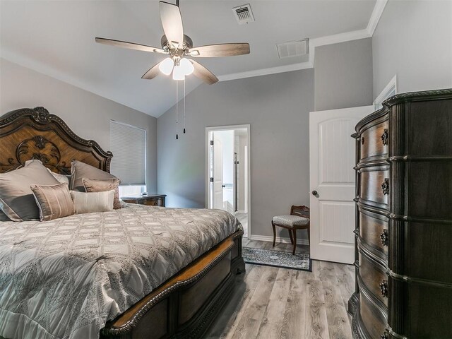 1401 Baycharter St, Norman, OK 73071 - bedroom featuring light wood-style flooring, vaulted ceiling, crown molding, and ceiling fan
