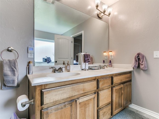 1401 Baycharter St, Norman, OK 73071 - bathroom with double vanity and a textured wall