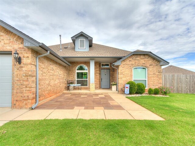 1401 Baycharter St, Norman, OK 73071 - view of front of home with brick siding and roof with shingles
