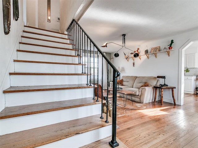2647 NW 24th St, Oklahoma City, OK 73107 - staircase with wood finished floors