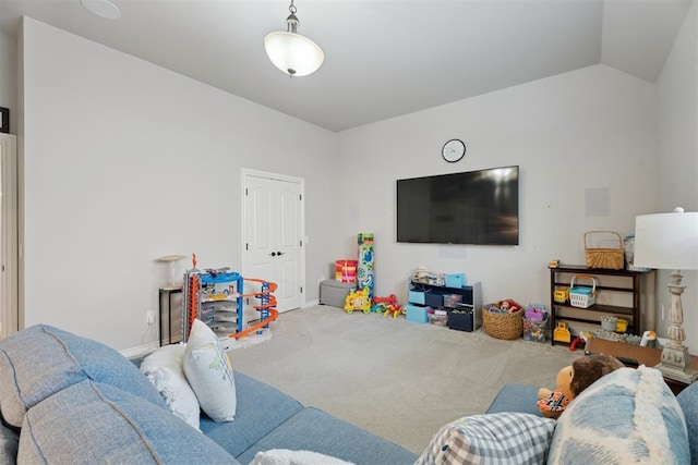 19804 Dalemead Way, Edmond, OK 73012 - carpeted living area featuring lofted ceiling and baseboards