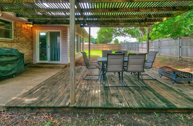 100 Three Oaks Dr, Midwest City, OK 73130 - wooden terrace featuring outdoor dining space, a fenced backyard, a pergola, and grilling area