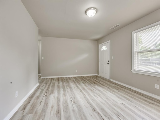6617 NW 31st St, Bethany, OK 73008 - empty room featuring light wood finished floors and baseboards