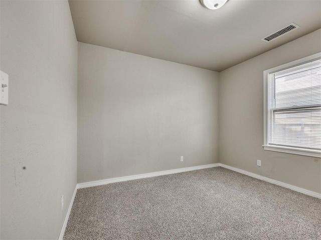 6617 NW 31st St, Bethany, OK 73008 - unfurnished room featuring carpet flooring and baseboards