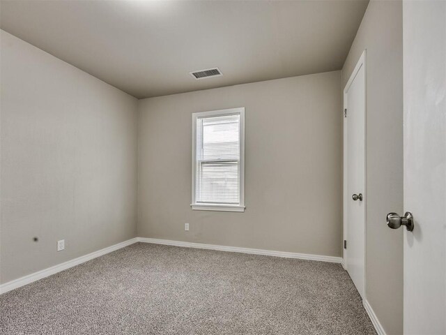 6617 NW 31st St, Bethany, OK 73008 - spare room featuring carpet